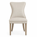Silla de comedor tapizada en poliéster beige con patas de madera